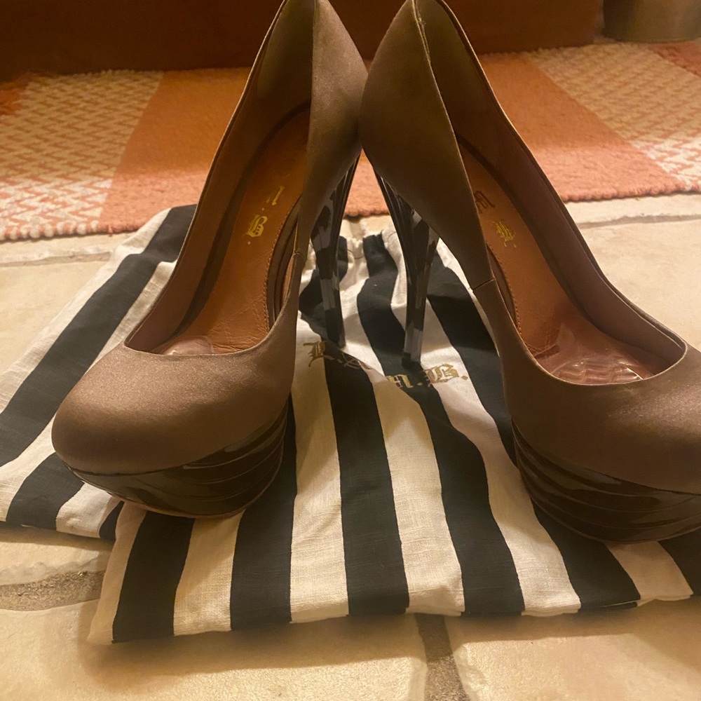 Lamb satin heels worn twice